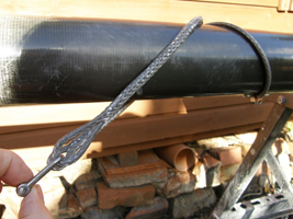 From the side view showing shackle and fairlead under boom.